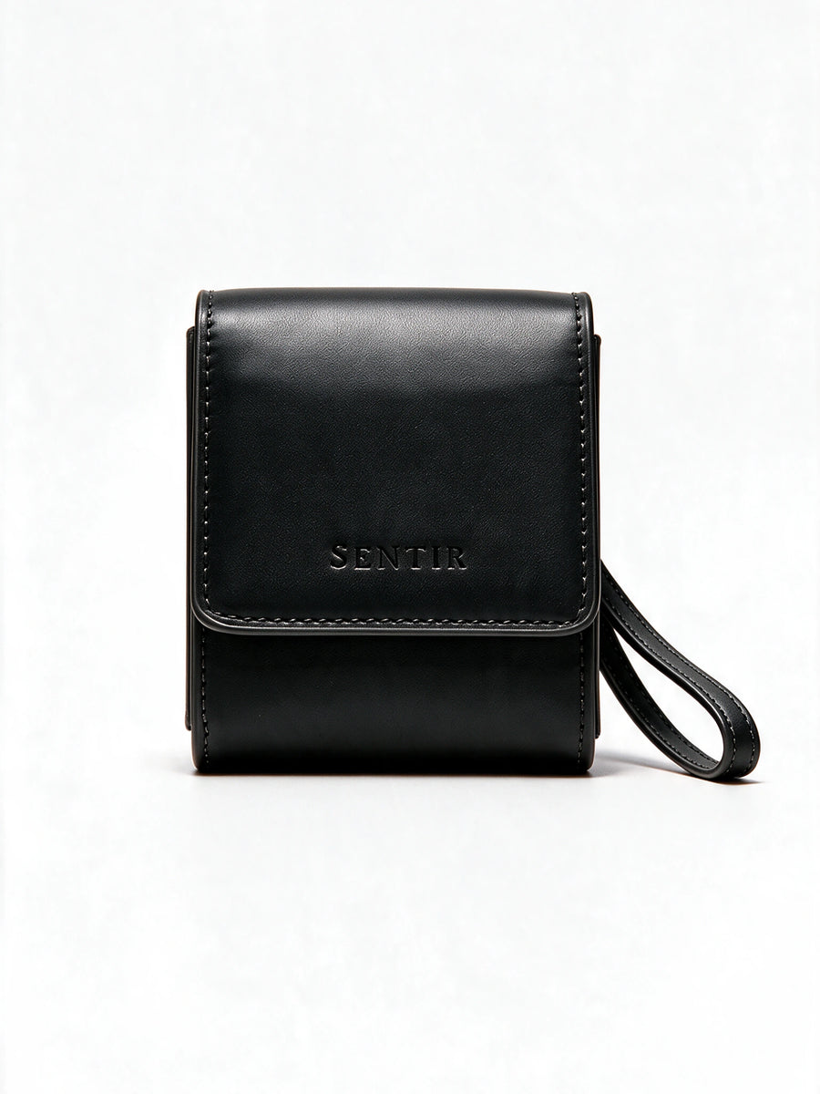 Sentir Parfum travel pouch in black vegan leather, closed front view
