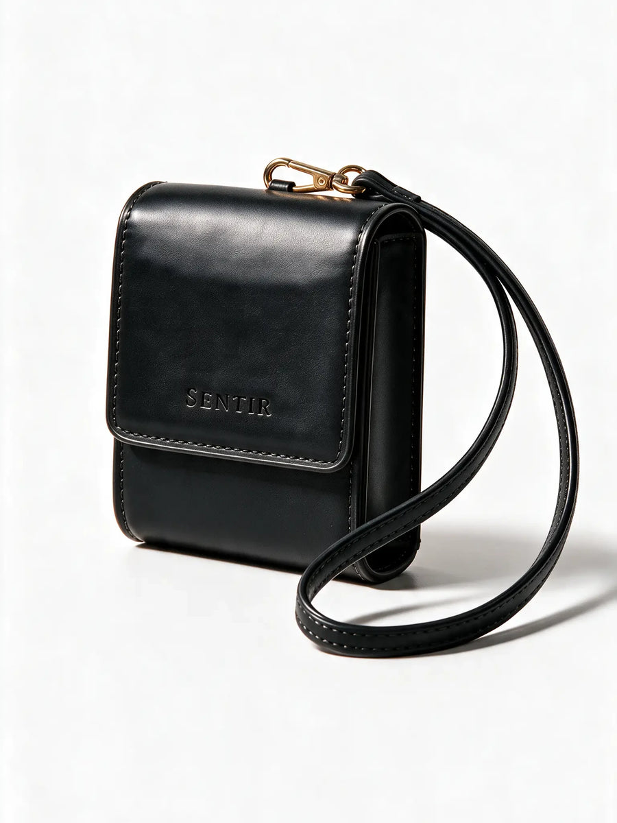 Black vegan leather travel pouch with wrist strap for three perfume bottles