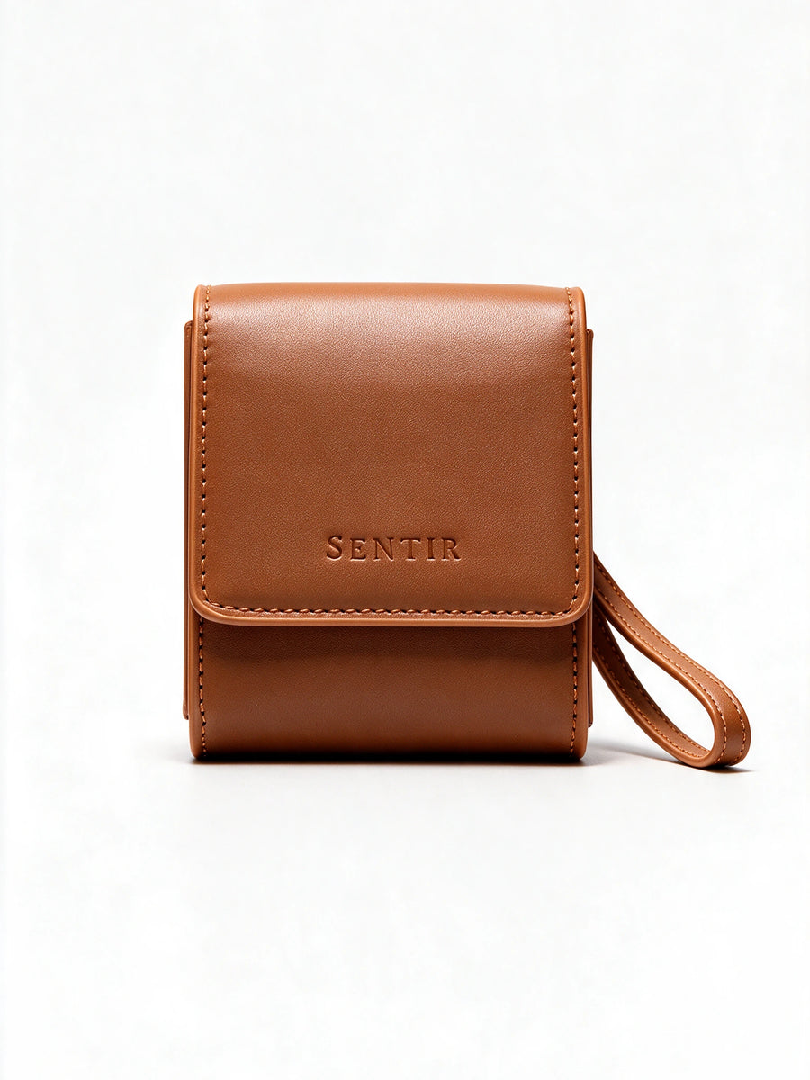 Sentir Parfum travel pouch in brown vegan leather, closed front view