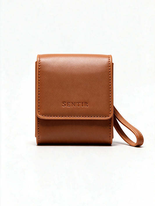 Sentir Parfum travel pouch in brown vegan leather, closed front view
