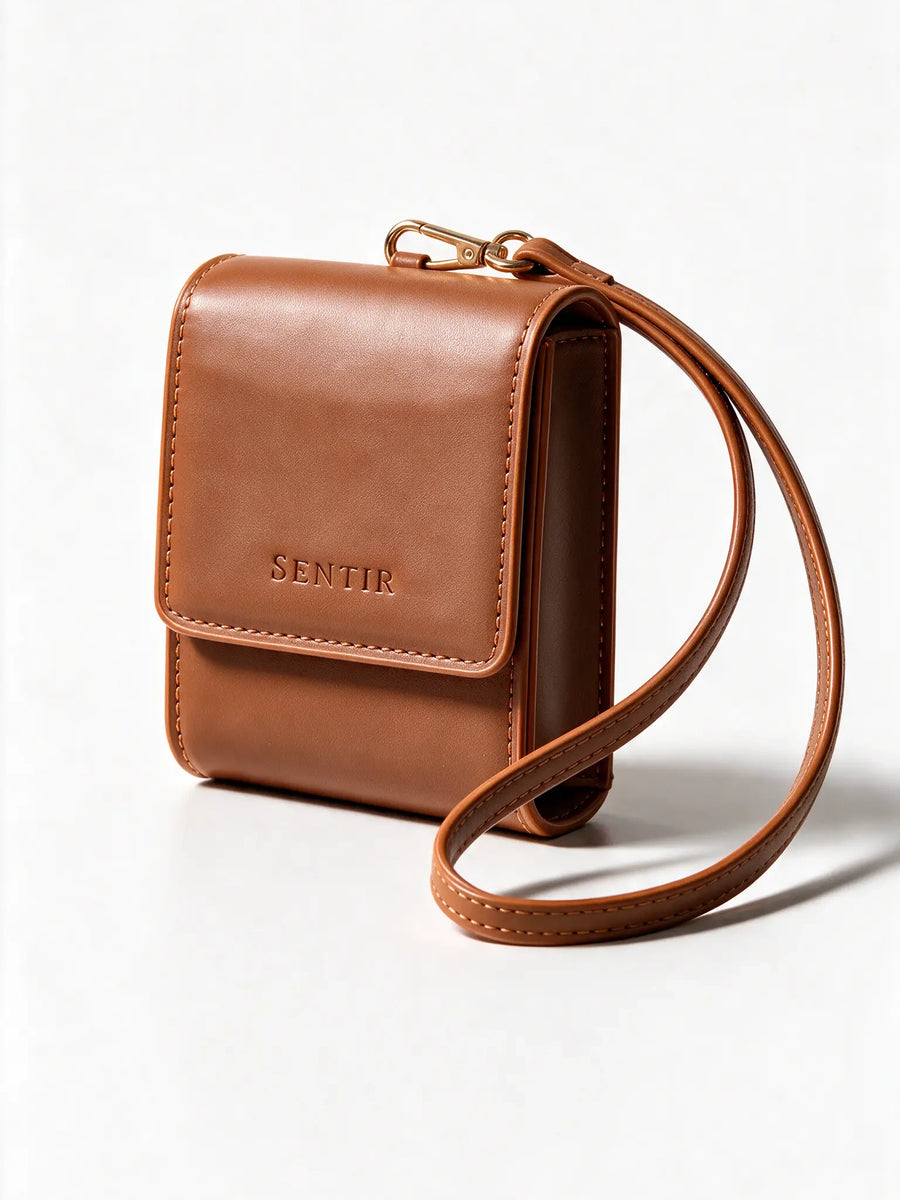 Brown vegan leather travel pouch with wrist strap for three perfume bottles